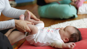 Birthlight Baby Yoga hold Knees to chest