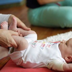 Birthlight Baby Yoga hold Knees to chest